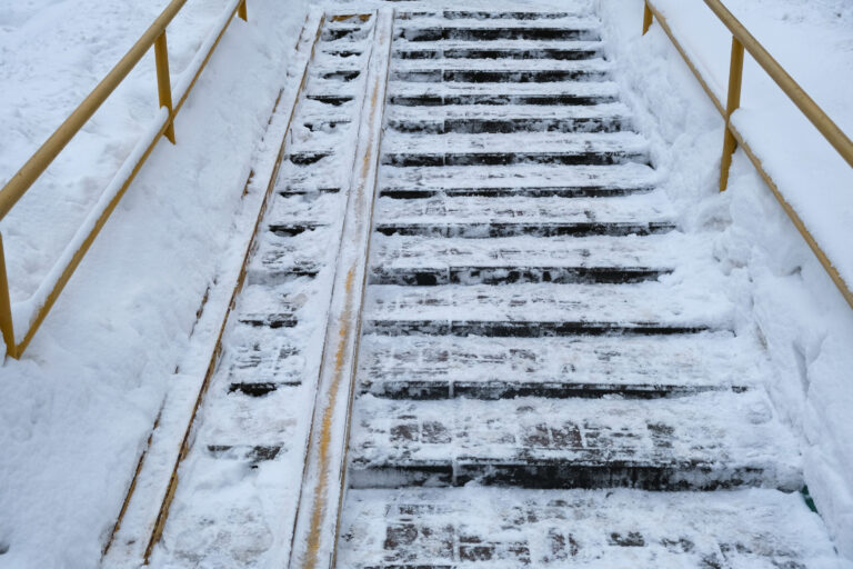 Prevent-Slipping-On-Ice-Covered-Stairs-By-Using-Instant-Traction-Agents